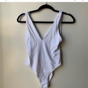 White Zara bodysuit. New without tags.